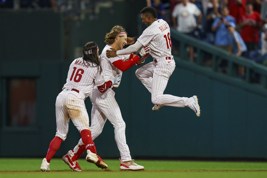 Phillies walk off for comeback win after 3-run 9th