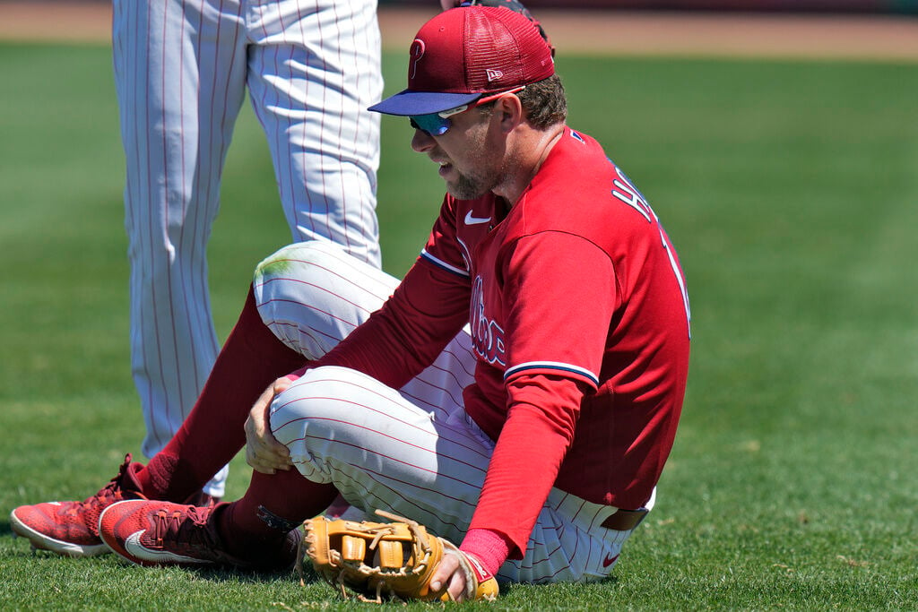 Phillies' injured first baseman Rhys Hoskins remains a long shot to make  postseason roster, The Latest from WDEL Sports
