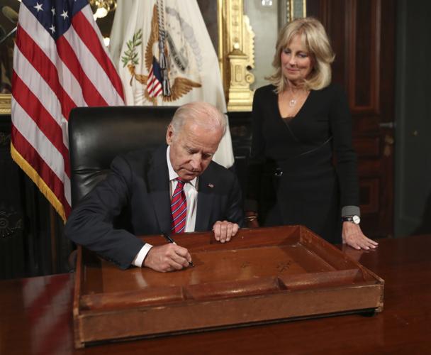 VIDEO: Biden signs desk drawer in ceremonial office | The Latest from WDEL  News 