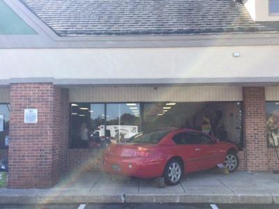 Car slams into building in Bear's Fox Run Shopping Center | The Latest
