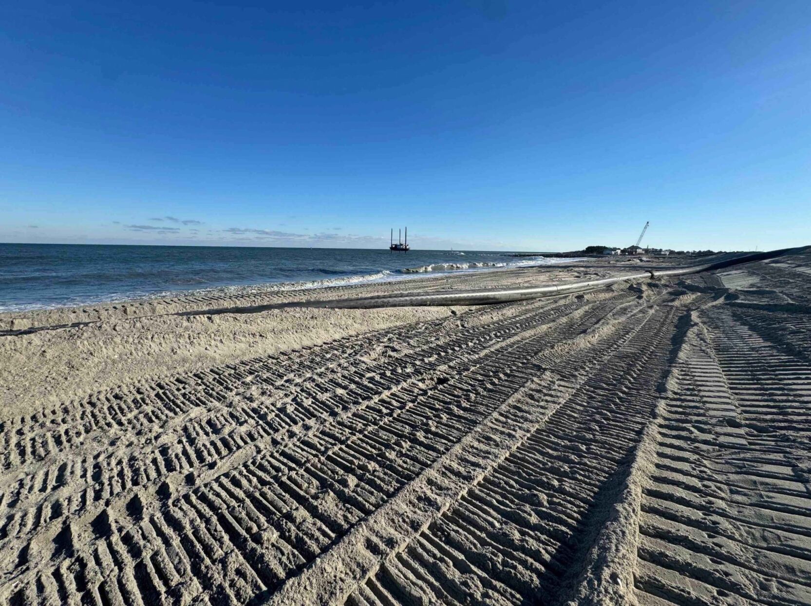 Work to replenish beach near Indian River Bridge continues