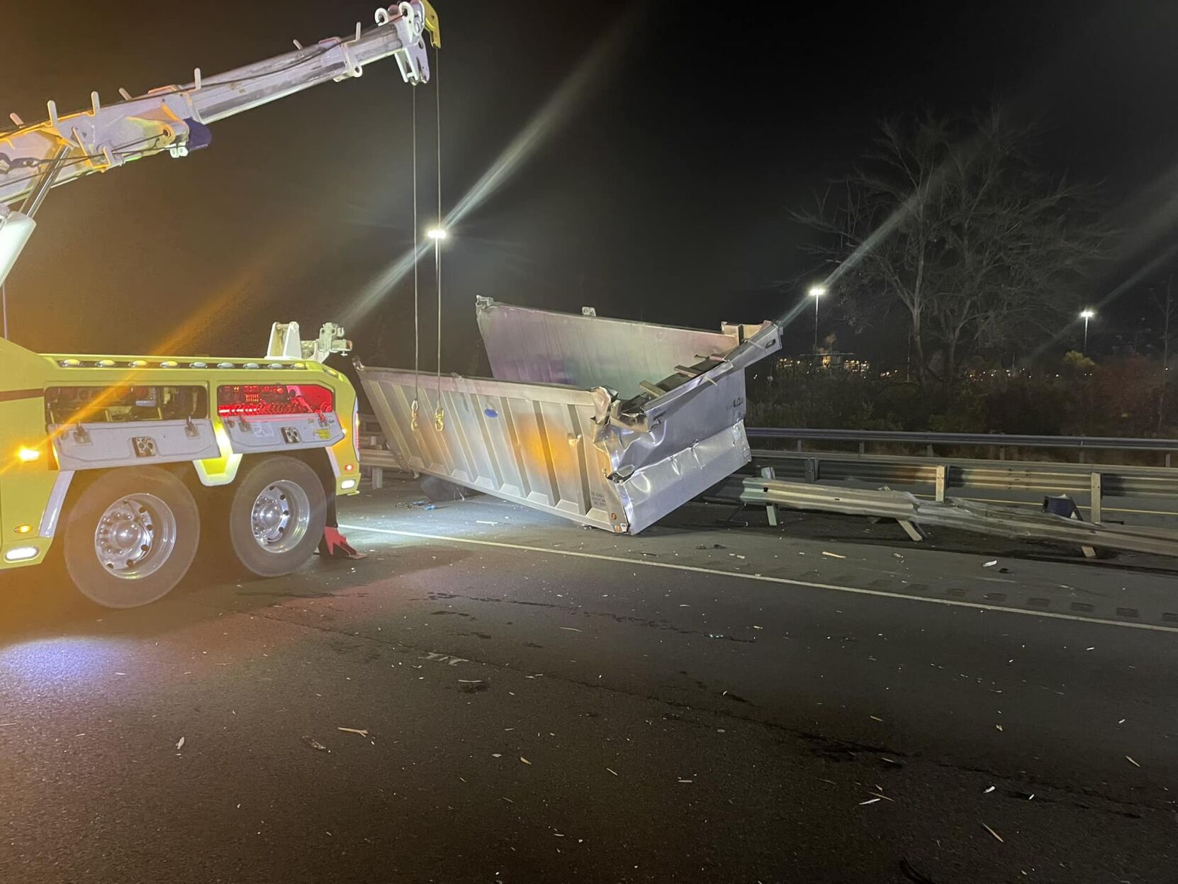 Truck hits bridge overpass and shuts down part of I-95