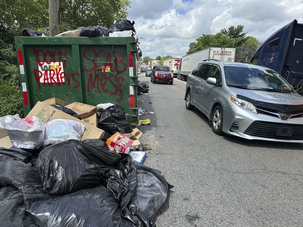 Philadelphia workers and city reach a deal to end strike that halted residential trash pickup