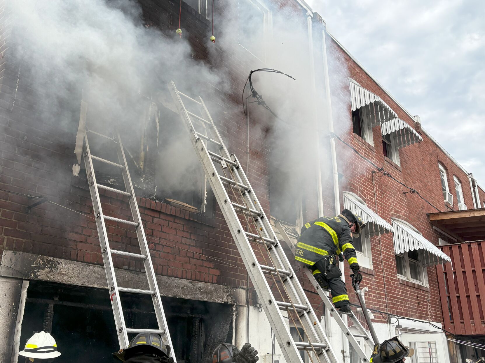 Fire scorches row home in Canby Park