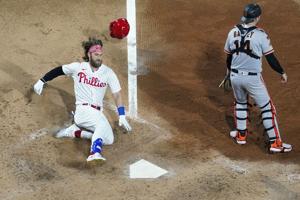 Harper races for inside-the-park HR, Nola works 7 strong innings as Phillies beat Giants
