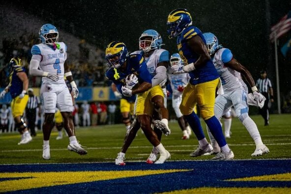 Delaware pulls away from stubborn Delaware State to begin FBS era