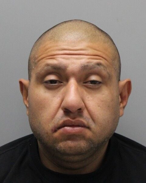 One suspect arrested, one at-large following grocery store robbery