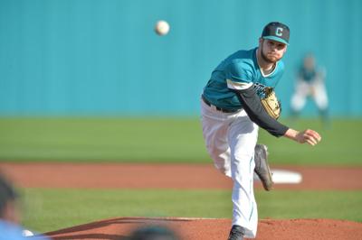 Jason Bilous throws a pitch for Coastal Carolina