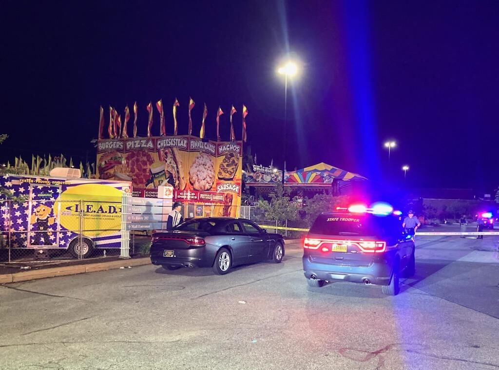 Victim of deadly shooting near carnival identified; suspect still being ...