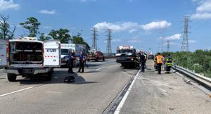 Three injured in I-495 rollover wreck