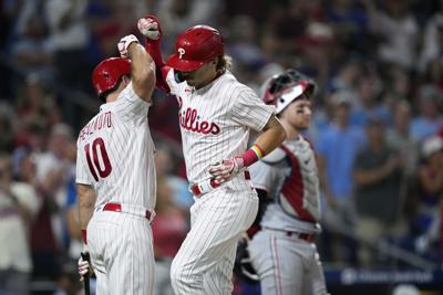 Stott, Realmuto, Rojas homer for NL wild card-leading Phillies in