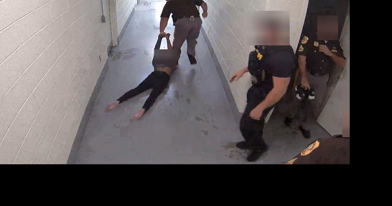 VIDEO | New Castle County Police officer drags young woman down hallway ...