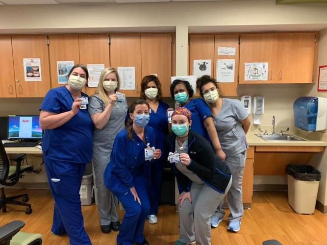 Louisville health care workers make blue heart stickers to celebrate 'healthcare heroes'