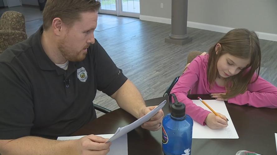 Southern Indiana police officers tutor children in after-school program