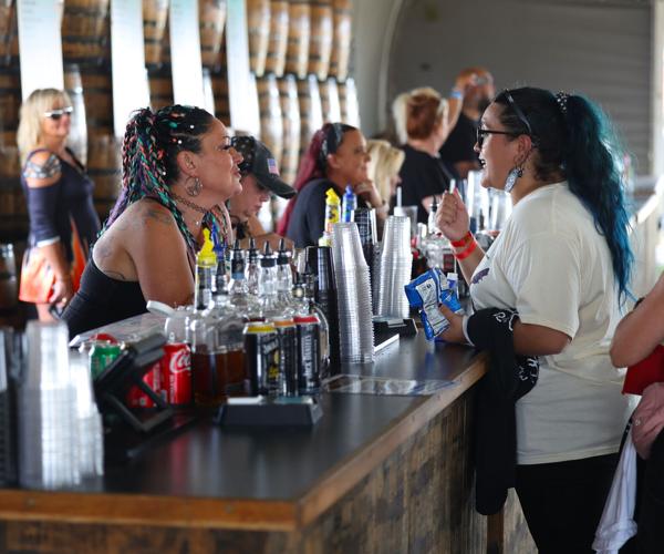 Person gets drink at Bourbon and Beyond.JPG