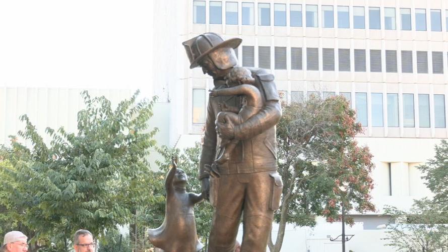 Statue of firefighter at Jefferson Square Park in downtown Louisville