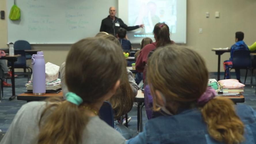 Astronaut Don Thomas, Ph.D., visits with Hazelwood Middle School students