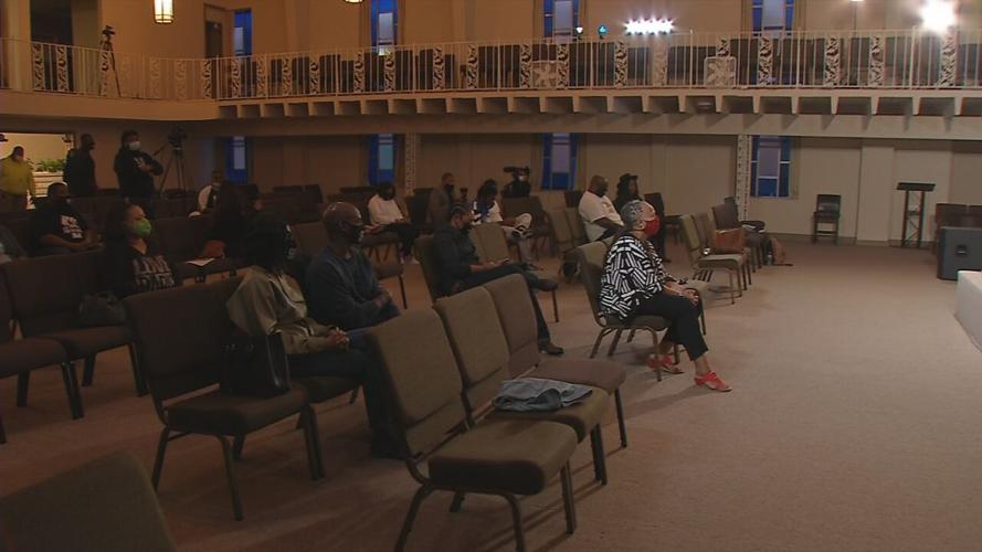 A crowd of people attend the "Know the Issues, Own the Vote" Symposium at the Kingdom Fellowship Christian Life Center