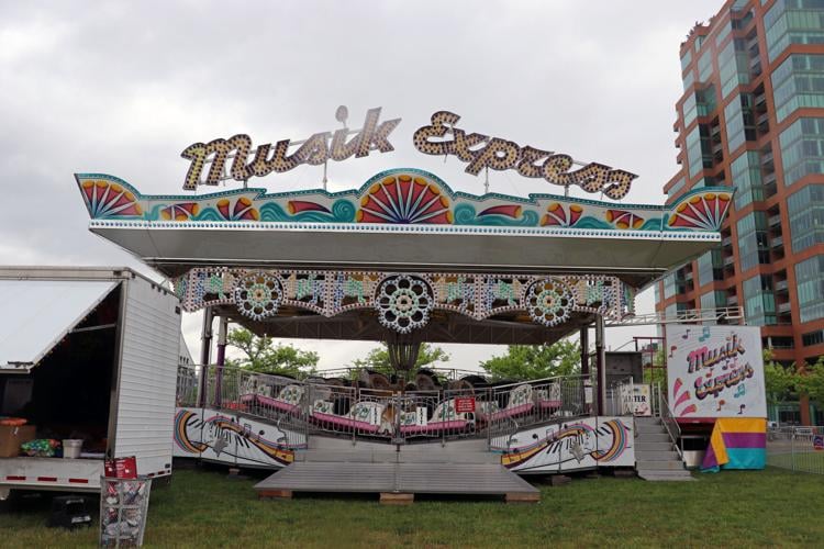 Crews set up booths along the Ohio River one day before Thunder Over Louisville 2023