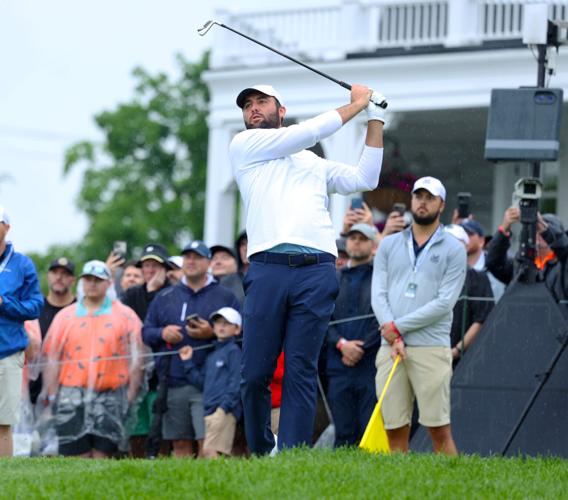 Scottie Scheffler hits on the tee box.JPG