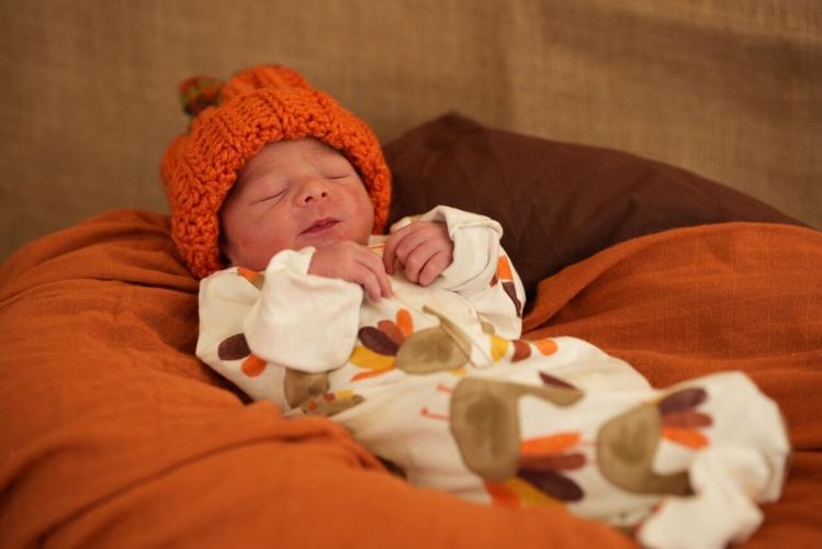 Newborn dressed for Thanksgiving at Norton Hospital