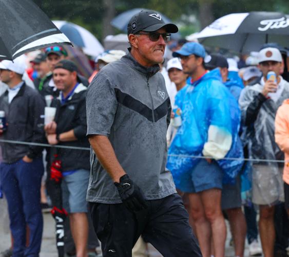 Phil Mickelson walks down the fairway.JPG
