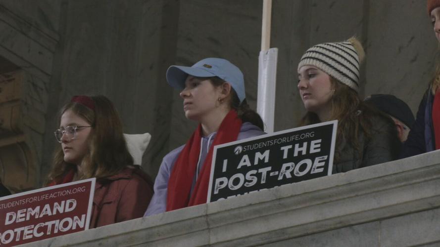 People stand at the Right to Life rally in Frankfort