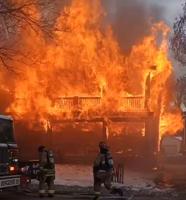 Firefighters battle house fire in Old Louisville Thursday