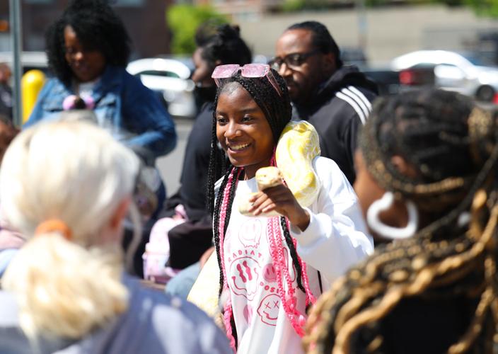 Snake with girl for photo.JPG
