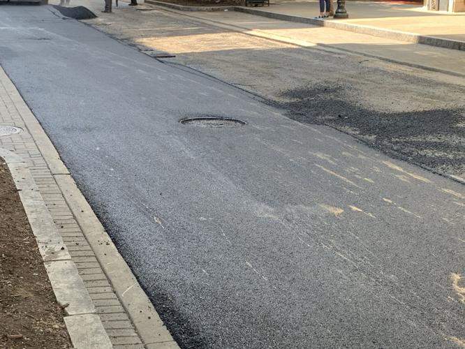 A newly paved road in downtown Louisville on July 26, 2023