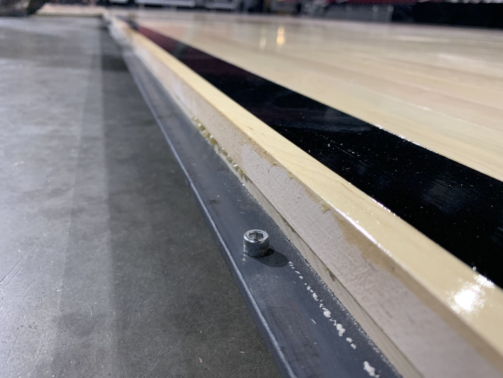 NCAA FLOOR  BEING INSTALLED AT YUM CENTER 3-21-2023 (25).JPG