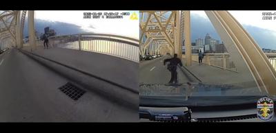 LMPD body cam - Woman saves man on 2nd Street Bridge 1-26-25.JPG