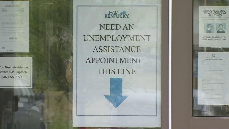 Signs directing people inside for unemployment claims