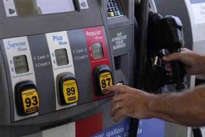 Customer pumps gas at Exxon