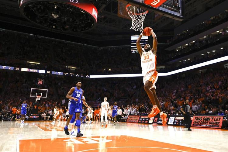 Tennessee guard Josiah Jordan James goes for a dunk against Kentucky.jpeg