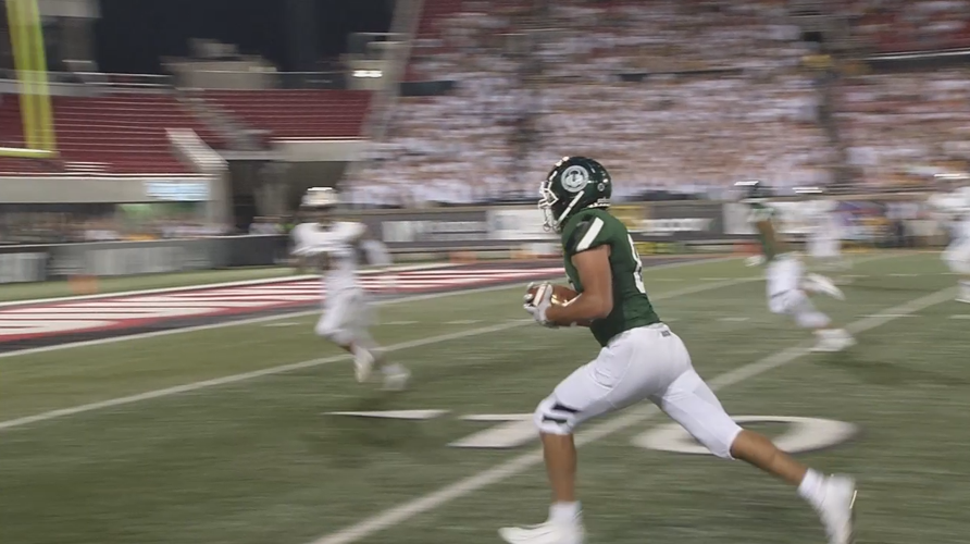 Trinity's Kaelan Racculia runs with the ball