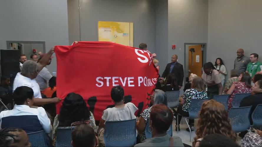 PROTESTORS  AT MAYOR NEWS CONFERENCE.jpeg