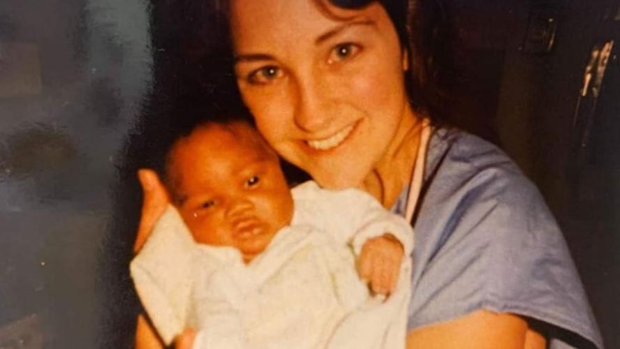 Lissa McGowan holds then-newborn David Caldwell decades ago