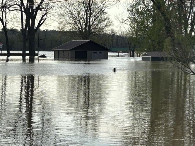 Submerged home in in Utica, Indiana
