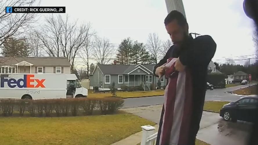 FEDEX WORKER STOPS TO FOLD FLAG 1130 VO