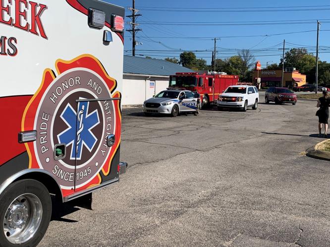 Firefighters at the scene of a fire at Brown Suburban Apartments on Bardstown Road