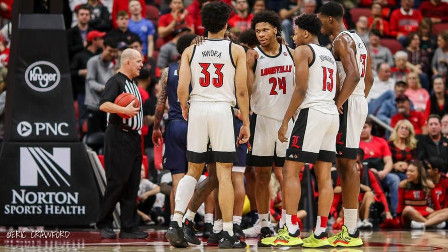Louisville team huddle