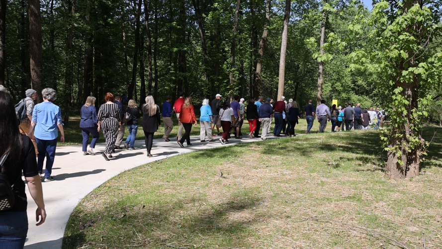 People walk to kayak ramp
