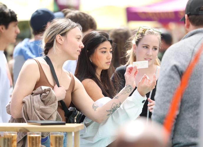 Girls purchase items at Bock Fest
