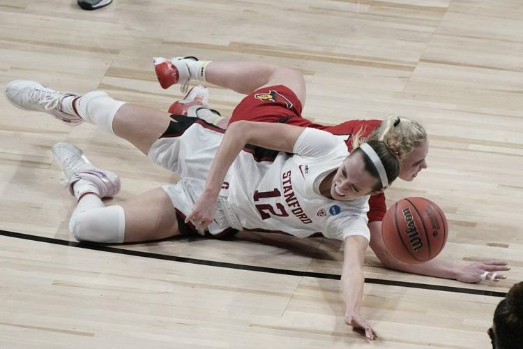 Stanford's Lexie Hull and Louisville's Hailey Van Lith go after a loose ball