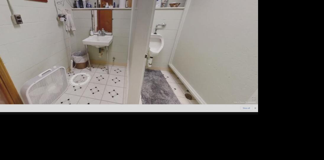Urinals and bathroom stalls inside home