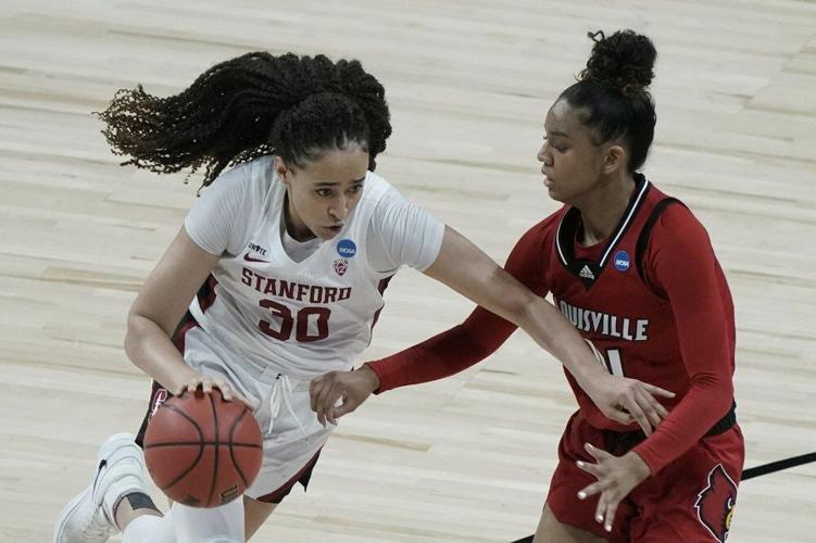 Stanford's Haley Jones tries to drive past Louisville's Kianna Smith