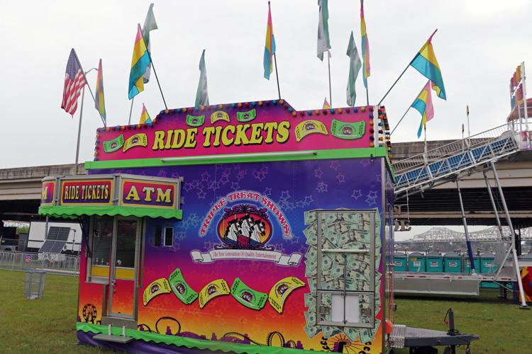 Crews set up booths along the Ohio River one day before Thunder Over Louisville 2023