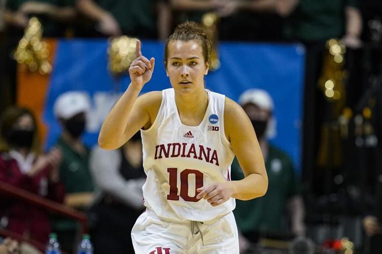 Indiana forward Aleska Gulbe celebrates a basket against Charlotte.jpeg