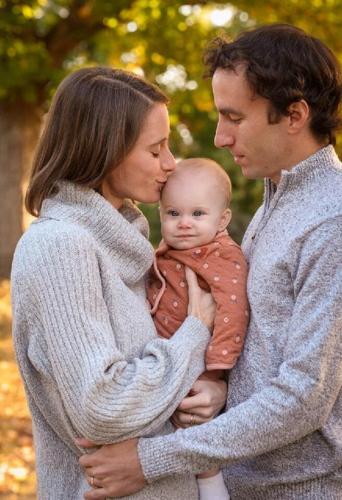 Angela Hapner Musk Kissing baby.jpg